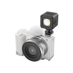 SmallRig 4734 Adattatore cold shoe con parabrezza peloso (bianco) per fotocamere Sony serie ZV